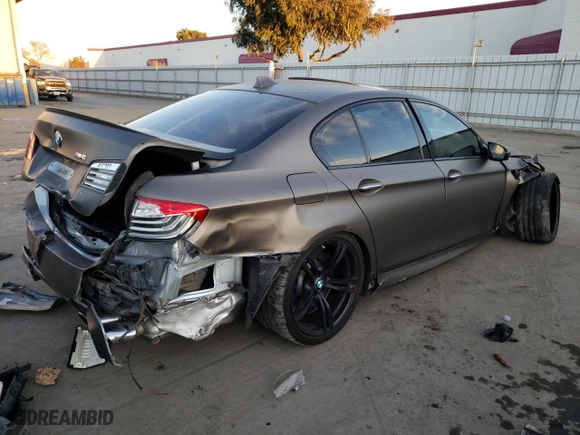 2015 BMW M5 with VIN WBSFV9C5XFD595067, listed as a Copart auction lot 80183913 with 0 mi miles. Bid and sale history available at carsss.com. Image 3.