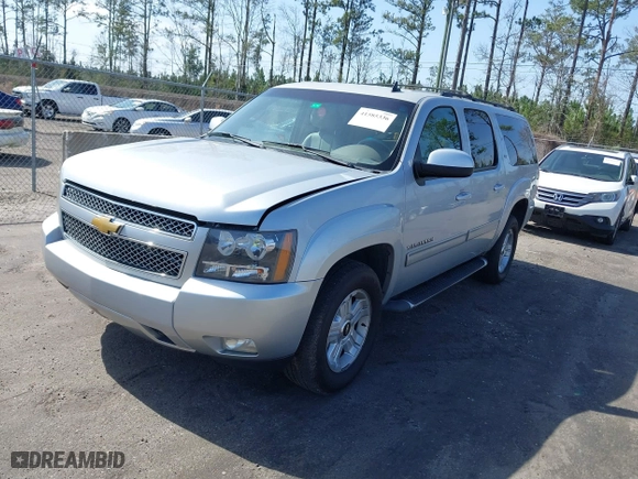 2013 Chevrolet Suburban LT with VIN 1GNSKJE71DR213143, listed as a IAAI auction lot 41585336 with 103,635 mi miles. Bid and sale history available at carsss.com. Image 2.