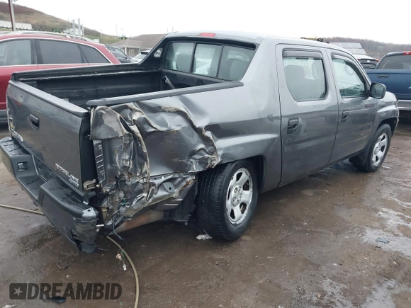 2012 Honda Ridgeline RT with VIN 5FPYK1F24CB456298, listed as a IAAI auction lot 40869948 with 123,329 mi miles and . Bid and sale history available at DreamBid. Image 4.