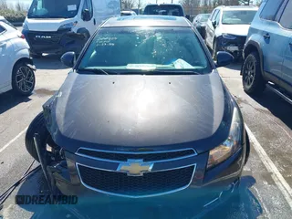 2014 Chevrolet Cruze 2LT z VIN 1G1PE5SB7E7200554, wystawiony jako IAAI lot #41739058 z przebiegiem 103 259 mil mil oraz . Historia ofert i sprzedaży dostępna na DreamBid. Obrazek 12.