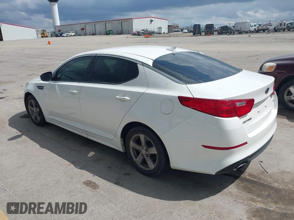 2015 Kia Optima LX with VIN KNAGM4A75F5640302, listed as a IAAI auction lot 42179864 with 95,891 mi miles and . Bid and sale history available at DreamBid. Image 3.
