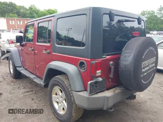 2013 Jeep Wrangler Unlimited Sport with VIN 1C4HJWDG7DL516077, listed as a IAAI auction lot 42521985 with 169,299 mi miles and . Bid and sale history available at DreamBid. Image 3.