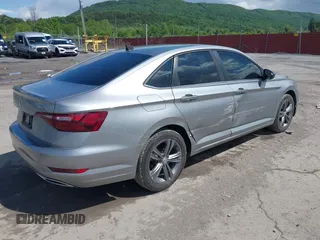 2021 Volkswagen Jetta S with VIN 3VWC57BU3MM031864, listed as a IAAI auction lot 42340036 with 59,193 mi miles and . Bid and sale history available at DreamBid. Image 4.