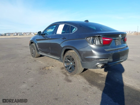 2015 BMW X6 xDrive35i with VIN 5UXKU2C50F0N77926, listed as a IAAI auction lot 41681268 with 136,118 mi miles. Bid and sale history available at carsss.com. Image 3.