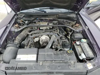 1996 Ford Mustang GT z VIN 1FALP42X8TF196321, wystawiony jako Copart lot #50874885 z przebiegiem 86 945 mil mil oraz Szkoda całkowita • Salvage title. Historia ofert i sprzedaży dostępna na DreamBid. Obrazek 11.