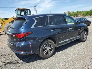 2020 Infiniti QX60 Luxe with VIN 5N1DL0MM2LC528742, listed as a Copart auction lot 56390605 with 66,786 mi miles and Salvage title. Bid and sale history available at DreamBid. Image 3.