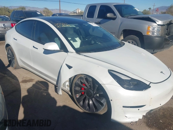 2021 Tesla Model 3 Performance with VIN 5YJ3E1EC6MF926448, listed as a IAAI auction lot 41240309 with 39,386 mi miles and . Bid and sale history available at DreamBid. Image 1.
