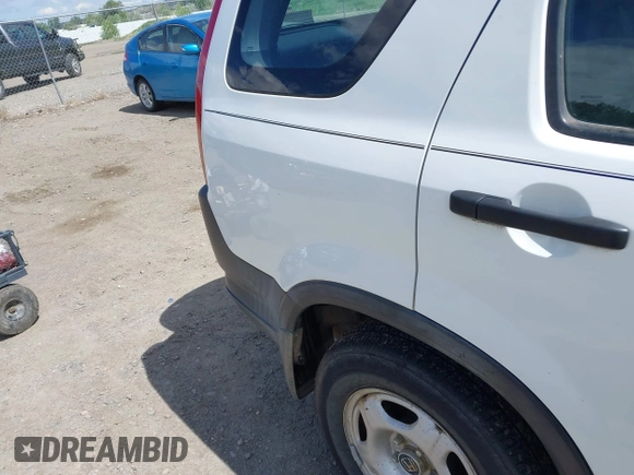 2003 Honda CR-V LX z VIN SHSRD78443U157640, wystawiony jako IAAI lot #42265529 z przebiegiem 154 407 mil mil oraz . Historia ofert i sprzedaży dostępna na DreamBid. Obrazek 16.