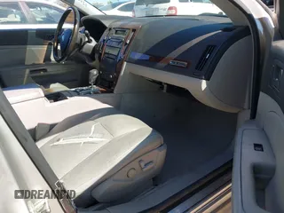 2005 Cadillac STS z VIN 1G6DW677350224198, wystawiony jako IAAI lot #42321639 z przebiegiem 122 208 mil mil oraz . Historia ofert i sprzedaży dostępna na DreamBid. Obrazek 5.