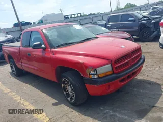 1999 Dodge Dakota SLT with VIN 1B7GL22X2XS129464, listed as a IAAI auction lot 41975506 with 99,437 mi miles and . Bid and sale history available at DreamBid. Image 1.