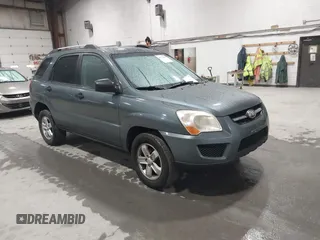 2009 Kia Sportage LX with VIN KNDJE723X97563261, listed as a IAAI auction lot 41771516 with 193,826 mi miles. Bid and sale history available at carsss.com. Image 1.