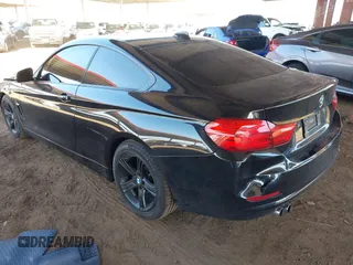 2015 BMW 4 Series 428i with VIN WBA3N3C55FK232613, listed as a IAAI auction lot 41865898 with 104,585 mi miles and . Bid and sale history available at carsss.com. Image 3.