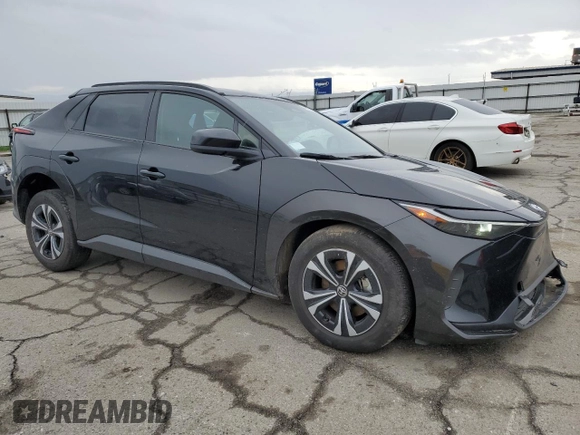 2023 Toyota bZ4X XLE with VIN JTMAAAAA7PA026565, listed as a Copart auction lot 44825145 with 17,890 mi miles and Salvage Title. Bid and sale history available at DreamBid. Image 4.