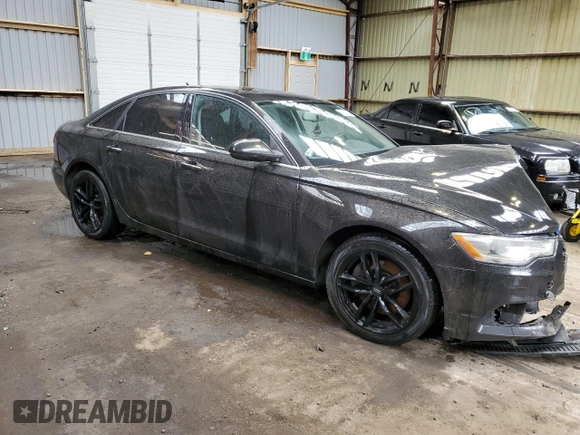 2015 Audi A6 with VIN WAUFFCFC9FN017044, listed as a Copart auction lot 51553694 with 181,733 mi miles and Salvage title. Bid and sale history available at DreamBid. Image 4.