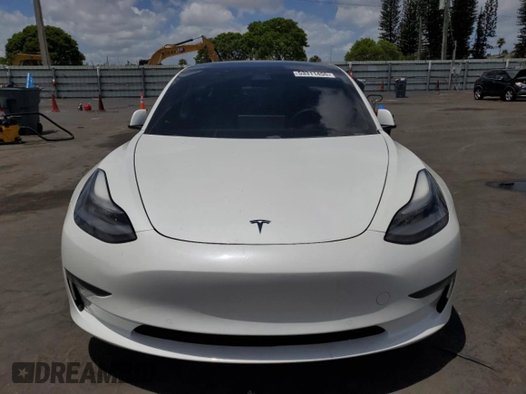 2021 Tesla Model 3 Standard Range Plus with VIN 5YJ3E1EA2MF985463, listed as a Copart auction lot 53311455 with 23,176 mi miles and Clean Title. Bid and sale history available at DreamBid. Image 5.