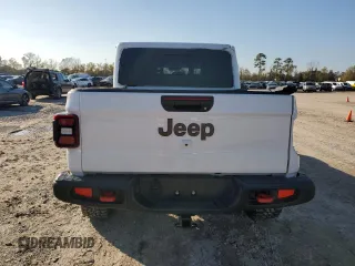 2022 Jeep Gladiator Rubicon with VIN 1C6JJTBG6NL142413, listed as a Copart auction lot 86098244 with 20,750 mi miles and Salvage title. Bid and sale history available at DreamBid. Image 6.