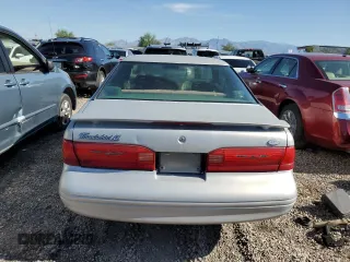 1997 Ford Thunderbird LX z VIN 1FALP62W2VH171912, wystawiony jako Copart lot #65073454 z przebiegiem 179 439 mil mil oraz Szkoda całkowita • Salvage title. Historia ofert i sprzedaży dostępna na DreamBid. Obrazek 6.