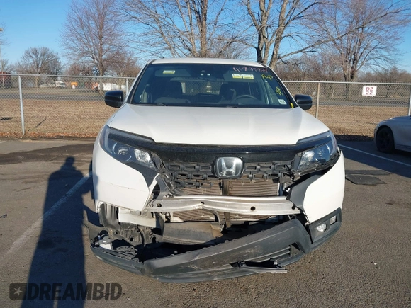 2021 Honda Passport Sport with VIN 5FNYF8H21MB031674, listed as a IAAI auction lot 41739769 with 36,894 mi miles and . Bid and sale history available at DreamBid. Image 12.