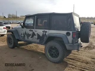 2015 Jeep Wrangler Unlimited Willys Wheeler with VIN 1C4BJWDG7FL690952, listed as a Copart auction lot 51493715 with 45,497 mi miles and Salvage Title. Bid and sale history available at DreamBid. Image 2.