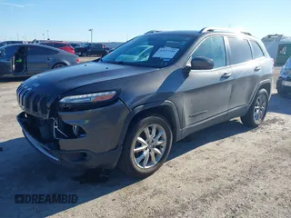 2014 Jeep Cherokee Limited with VIN 1C4PJMDS8EW271410, listed as a IAAI auction lot 41657246 with 132,930 mi miles. Bid and sale history available at carsss.com. Image 2.