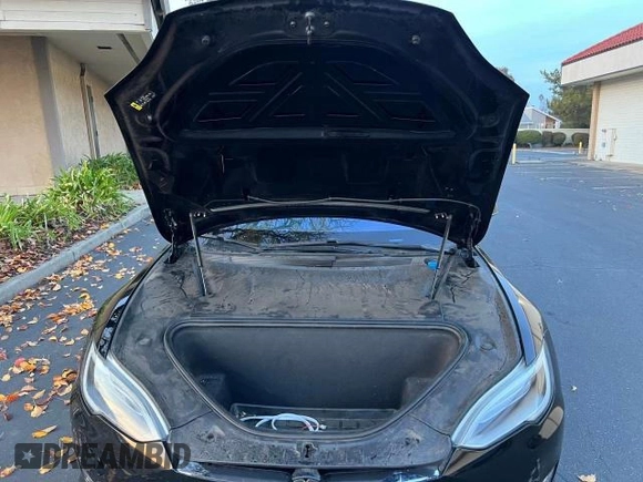 2017 Tesla Model S 60 with VIN 5YJSA1E15HF219286, listed as a Copart auction lot 57360515 with 44,520 mi miles and Salvage title. Bid and sale history available at DreamBid. Image 7.