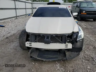 2014 Cadillac CTS Premium AWD with VIN 1G6AZ5S35E0156897, listed as a Copart auction lot 55838595 with 124,999 mi miles and Salvage title. Bid and sale history available at DreamBid. Image 5.