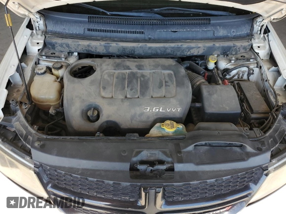 2015 Dodge Journey Crossroad with VIN 3C4PDCGG9FT631347, listed as a Copart auction lot 53991675 with 77,084 mi miles and Salvage Title. Bid and sale history available at DreamBid. Image 12.