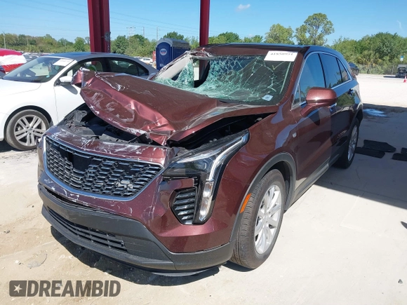 2022 Cadillac XT4 FWD Luxury with VIN 1GYAZAR42NF162880, listed as a IAAI auction lot 41850951 with 47,344 mi miles and . Bid and sale history available at carsss.com. Image 17.