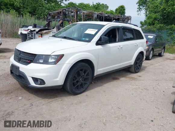 2014 Dodge Journey SXT z VIN 3C4PDCBBXET135001, wystawiony jako IAAI lot #42318360 z przebiegiem 152 321 mil mil oraz . Historia ofert i sprzedaży dostępna na DreamBid. Obrazek 2.