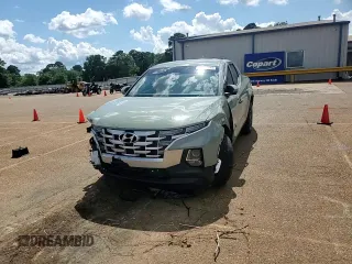 2023 Hyundai Santa Cruz SE z VIN 5NTJA4AE7PH069415, wystawiony jako Copart lot #56434945 z przebiegiem 43 866 mil mil oraz Szkoda całkowita • Salvage title. Historia ofert i sprzedaży dostępna na DreamBid. Obrazek 13.