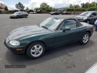 1999 Mazda MX-5 Miata z VIN JM1NB3539X0107918, wystawiony jako Copart lot #56693795 z przebiegiem 42 518 mil mil oraz Czysty tytuł • Clean title. Historia ofert i sprzedaży dostępna na DreamBid. Obrazek 1.