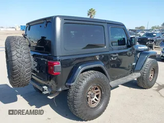 2018 Jeep Wrangler Sport with VIN 1C4GJXANXJW302523, listed as a IAAI auction lot 42527455 with 101,320 mi miles and . Bid and sale history available at DreamBid. Image 4.