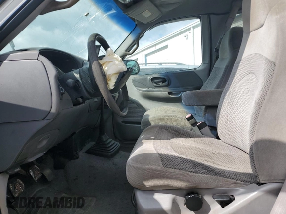 2000 Ford F-150 XL with VIN 1FTZX1727YNB23518, listed as a Copart auction lot 43914215 with 0 mi miles and Salvage Title. Bid and sale history available at carsss.com. Image 7.