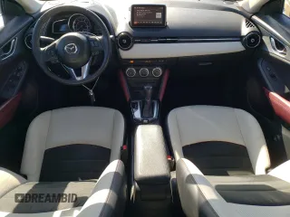 2016 Mazda CX-3 Grand Touring z VIN JM1DKBD7XG0107274, wystawiony jako Copart lot #52137385 z przebiegiem 35 376 mil mil oraz Szkoda całkowita • Salvage title. Historia ofert i sprzedaży dostępna na DreamBid. Obrazek 8.