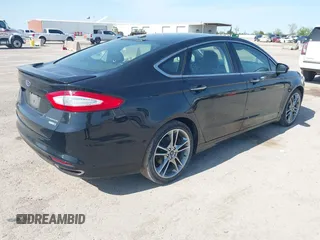 2016 Ford Fusion Titanium with VIN 3FA6P0D91GR237742, listed as a IAAI auction lot 41892627 with 73,616 mi miles and . Bid and sale history available at DreamBid. Image 4.