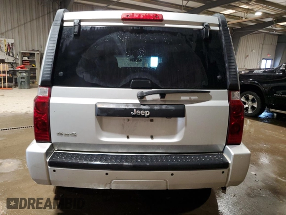 2009 Jeep Commander Sport z VIN 1J8HG48K09C526337, wystawiony jako Copart lot #89026135 z przebiegiem 194 514 mil mil oraz Szkoda całkowita • Salvage title. Historia ofert i sprzedaży dostępna na DreamBid. Obrazek 6.
