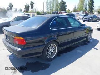1997 BMW 5 Series 540iA with VIN WBADE6325VBW55346, listed as a IAAI auction lot 42085046 with 216,212 mi miles. Bid and sale history available at carsss.com. Image 4.