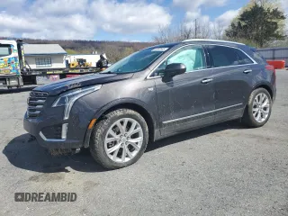 2017 Cadillac XT5 Luxury AWD with VIN 1GYKNDRS1HZ243825, listed as a Copart auction lot 52302665 with 115,674 mi miles and Salvage Title. Bid and sale history available at carsss.com. Image 1.