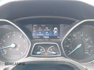 2015 Ford Focus SE with VIN 1FADP3F21FL326927, listed as a IAAI auction lot 42628577 with 112,199 mi miles and . Bid and sale history available at DreamBid. Image 7.
