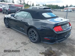 2022 Ford Mustang EcoBoost z VIN 1FATP8UH7N5124631, wystawiony jako IAAI lot #42322481 z przebiegiem 57 502 mil mil oraz . Historia ofert i sprzedaży dostępna na DreamBid. Obrazek 3.