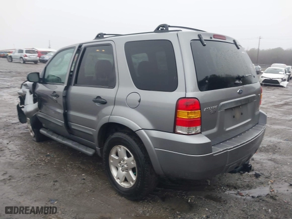 2007 Ford Escape XLT with VIN 1FMYU03177KB90563, listed as a IAAI auction lot 41566335 with 166,233 mi miles. Bid and sale history available at carsss.com. Image 3.