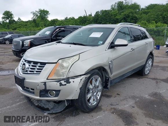 2014 Cadillac SRX Performance Collection z VIN 3GYFNCE35ES610504, wystawiony jako IAAI lot #42133548 z przebiegiem 140 306 mil mil oraz . Historia ofert i sprzedaży dostępna na DreamBid. Obrazek 17.