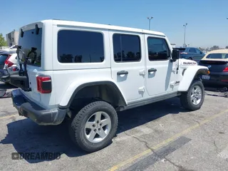 2018 Jeep Wrangler Unlimited Rubicon with VIN 1C4HJXFN8JW215023, listed as a IAAI auction lot 42227099 with 62,195 mi miles and . Bid and sale history available at DreamBid. Image 4.