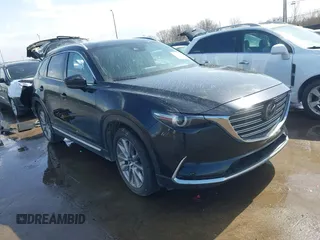 2020 Mazda CX-9 Grand Touring with VIN JM3TCBDY2L0413839, listed as a IAAI auction lot 41720713 with 48,964 mi miles and . Bid and sale history available at DreamBid. Image 1.
