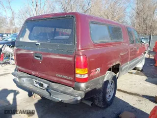 1999 Chevrolet Silverado 1500 LS with VIN 1GCEK19T1XE122222, listed as a IAAI auction lot 41753362 with 130,618 mi miles. Bid and sale history available at carsss.com. Image 4.