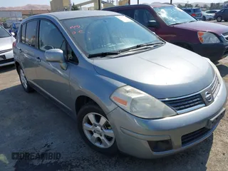 2009 Nissan Versa S with VIN 3N1BC13E69L421401, listed as a IAAI auction lot 42732692 with 121,587 mi miles and . Bid and sale history available at DreamBid. Image 1.