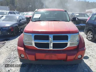 2010 Dodge Nitro SE with VIN 1D4PT2GK7AW142856, listed as a IAAI auction lot 41855687 with 197,248 mi miles. Bid and sale history available at carsss.com. Image 13.