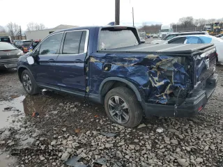 2017 Honda Ridgeline RTL with VIN 5FPYK3F57HB011597, listed as a Copart auction lot 49307885 with 140,157 mi miles and Salvage title. Bid and sale history available at DreamBid. Image 2.