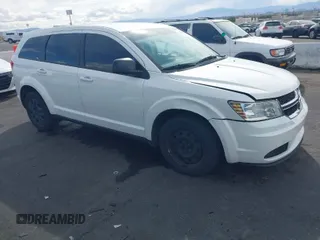 2015 Dodge Journey American Value Pkg with VIN 3C4PDCAB7FT684318, listed as a IAAI auction lot 41950431 with 175,142 mi miles. Bid and sale history available at carsss.com. Image 1.