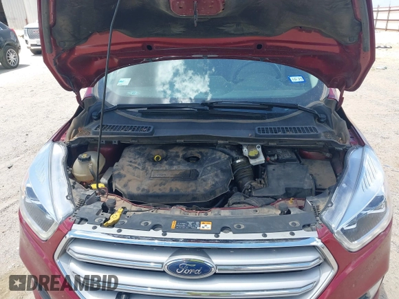 2018 Ford Escape Titanium with VIN 1FMCU0J96JUD58854, listed as a IAAI auction lot 42590609 with 77,825 mi miles and . Bid and sale history available at DreamBid. Image 10.